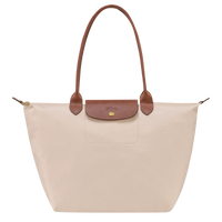 Bolso Grande Premium, Papel