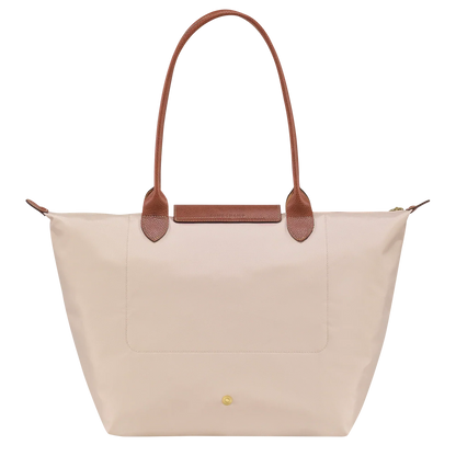 Bolso Grande Premium, Papel